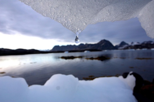 An iceberg melts in Kulusuk, Greenland near the arctic circle. (John McConnico/AP)